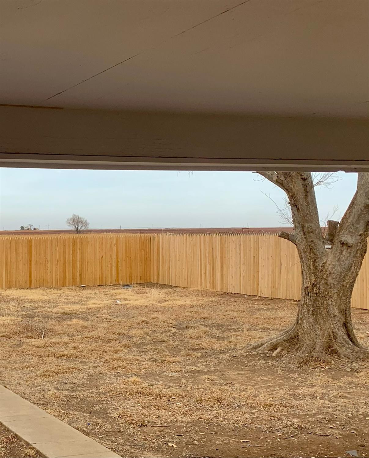 1007 17th Street Ralls, TX 79357 - Photo 10 of 12 a view of swimming pool with an outdoor space and seating area
