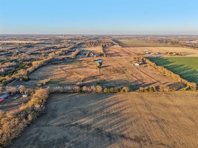 an aerial view of beach and ocean