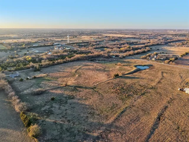 an aerial view of residential building and ocean