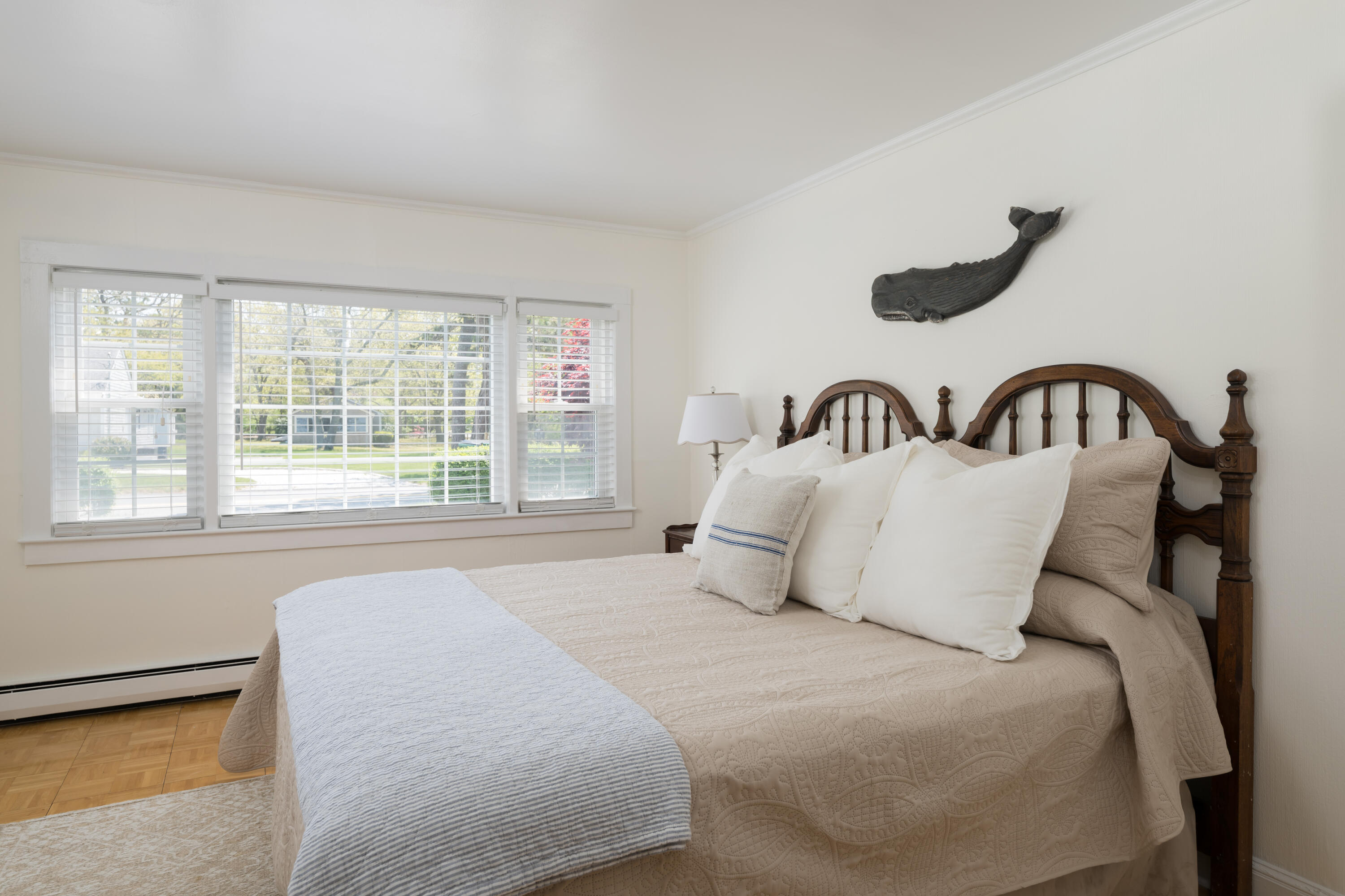 111 Lewis Road West Yarmouth, MA 02673 - Photo 20 of 43 a bedroom with a bed and a large window