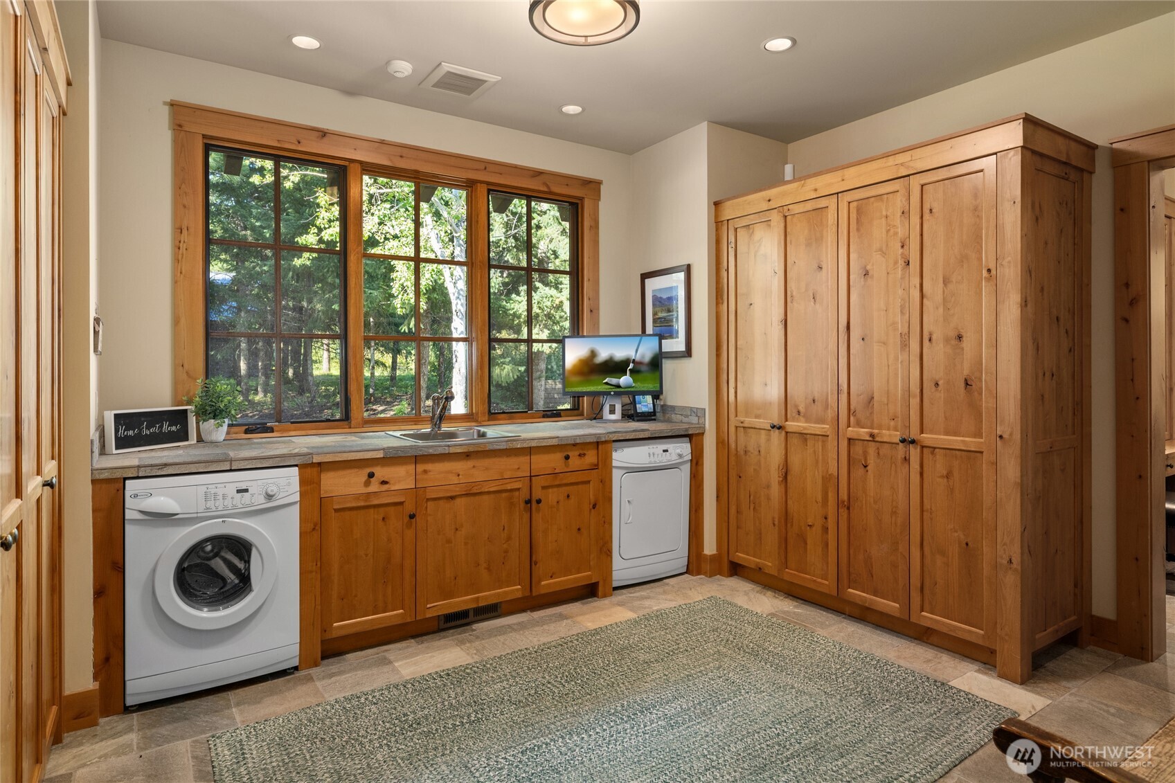 151 Rushing Water Lane Cle Elum, WA 98922 - Photo 15 of 40 a kitchen with a refrigerator and sink