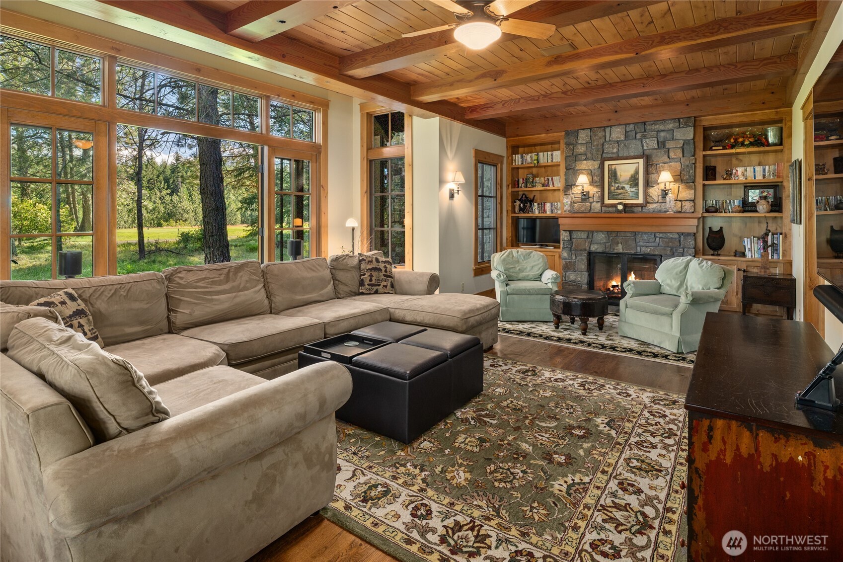 151 Rushing Water Lane Cle Elum, WA 98922 - Photo 17 of 40 a living room with furniture and a large window