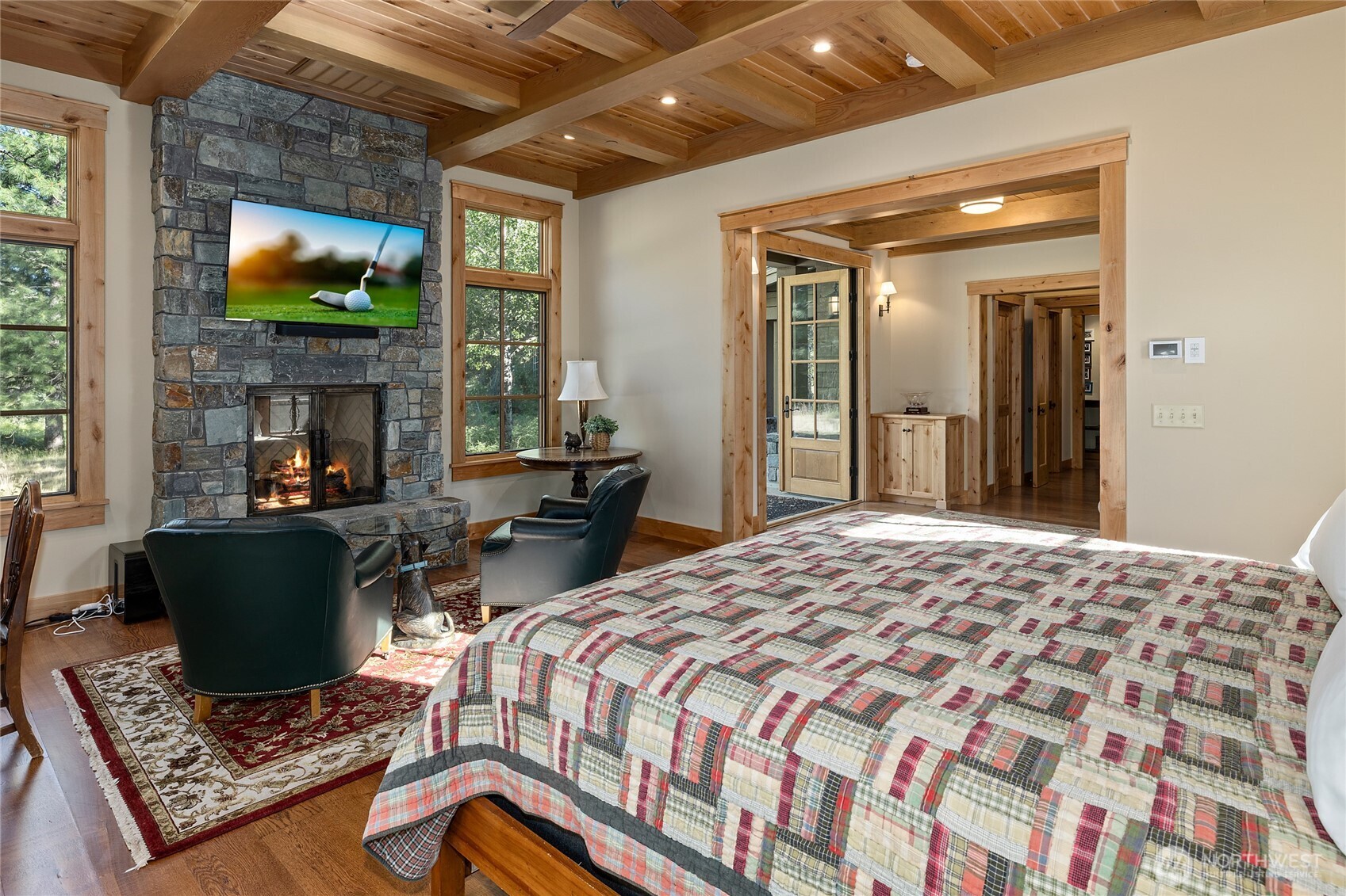 151 Rushing Water Lane Cle Elum, WA 98922 - Photo 20 of 40 a bedroom with furniture and a fireplace