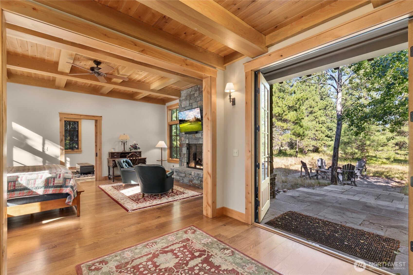 151 Rushing Water Lane Cle Elum, WA 98922 - Photo 21 of 40 a living room with furniture and a floor to ceiling window