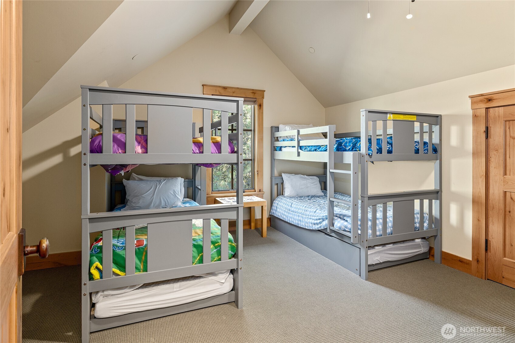 151 Rushing Water Lane Cle Elum, WA 98922 - Photo 25 of 40 a bedroom with furniture and a baby crib