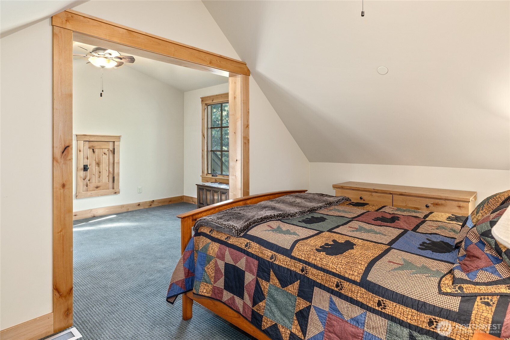 151 Rushing Water Lane Cle Elum, WA 98922 - Photo 27 of 40 a bedroom with a bed and a window