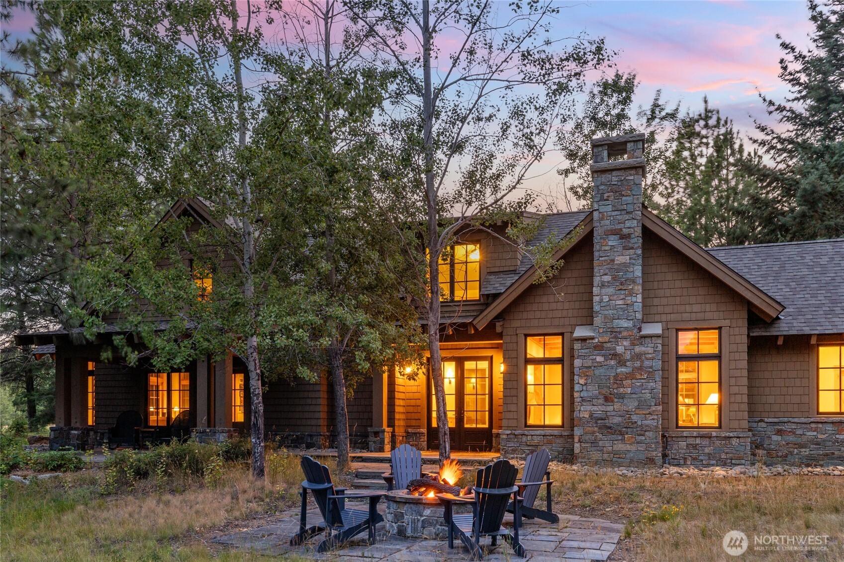 151 Rushing Water Lane Cle Elum, WA 98922 - Photo 3 of 40 a front view of a house with outdoor seating