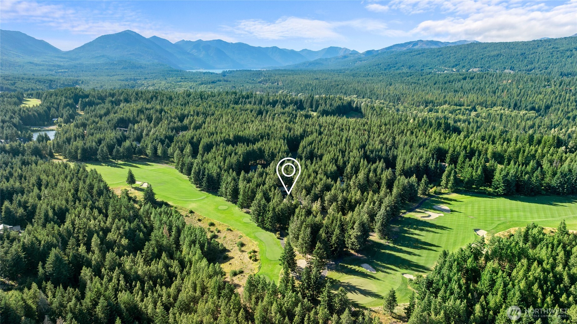 151 Rushing Water Lane Cle Elum, WA 98922 - Photo 39 of 40 a view of a lush green hillside and a houses