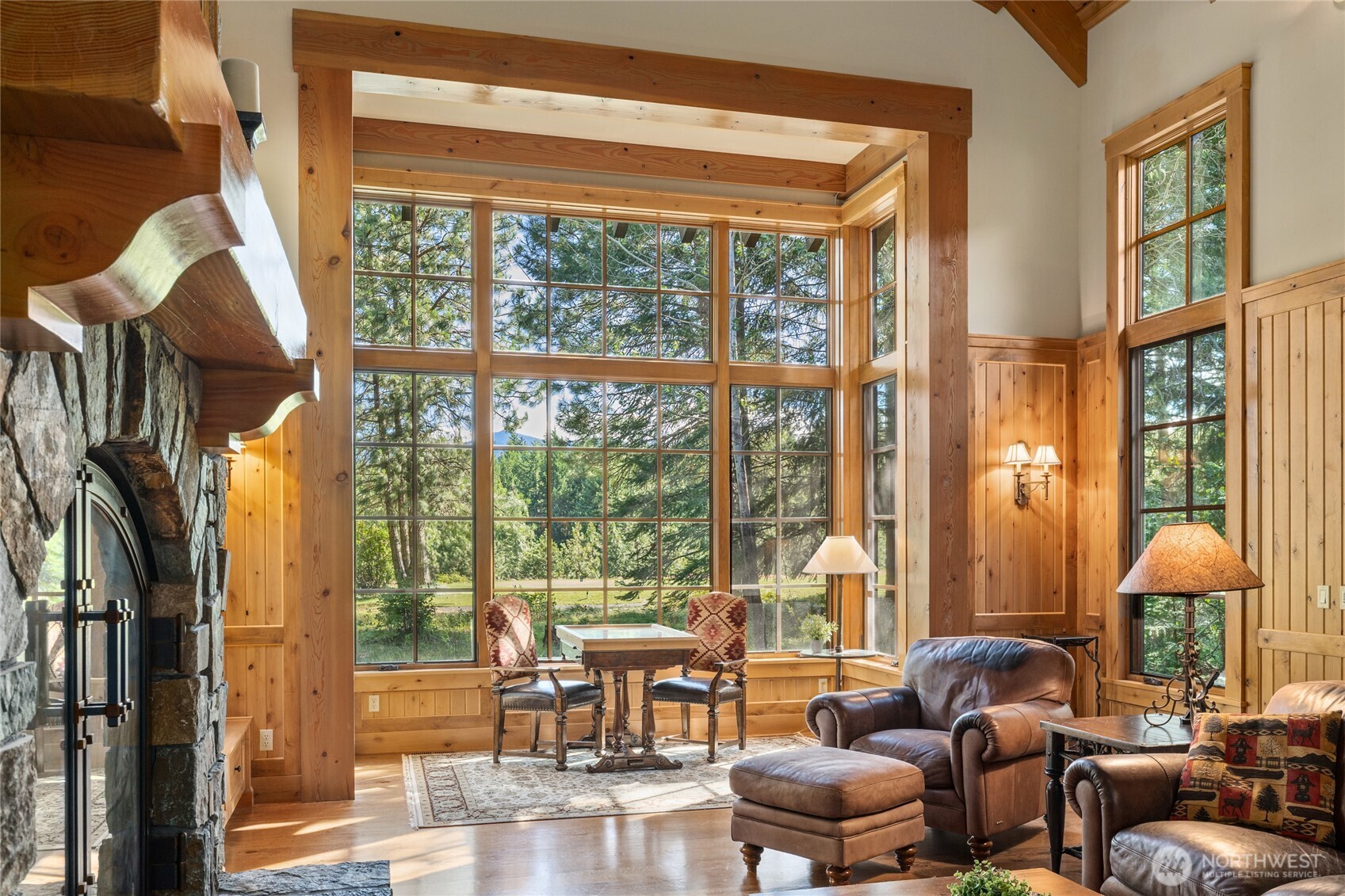 151 Rushing Water Lane Cle Elum, WA 98922 - Photo 7 of 40 a living room with furniture and floor to ceiling windows