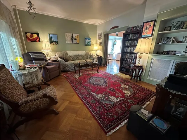 a living room with furniture and a rug