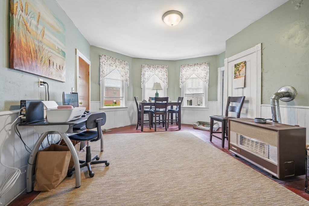 286 Columbia Street Fall River, MA 02721 - Photo 25 of 29 a living room with furniture and wooden floors