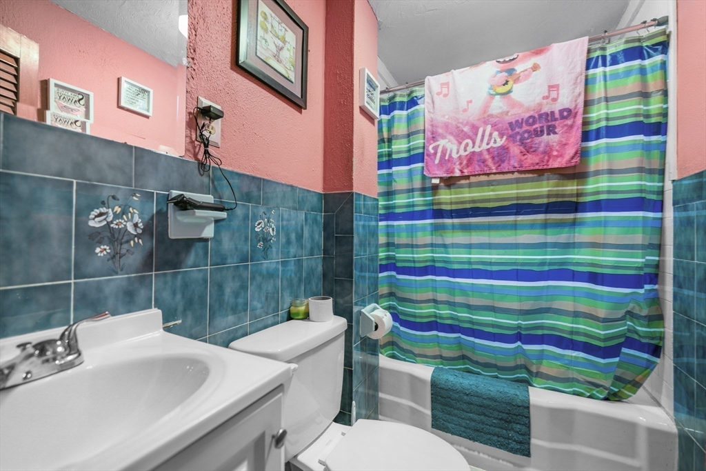 286 Columbia Street Fall River, MA 02721 - Photo 27 of 29 a bathroom with a sink toilet and a shower