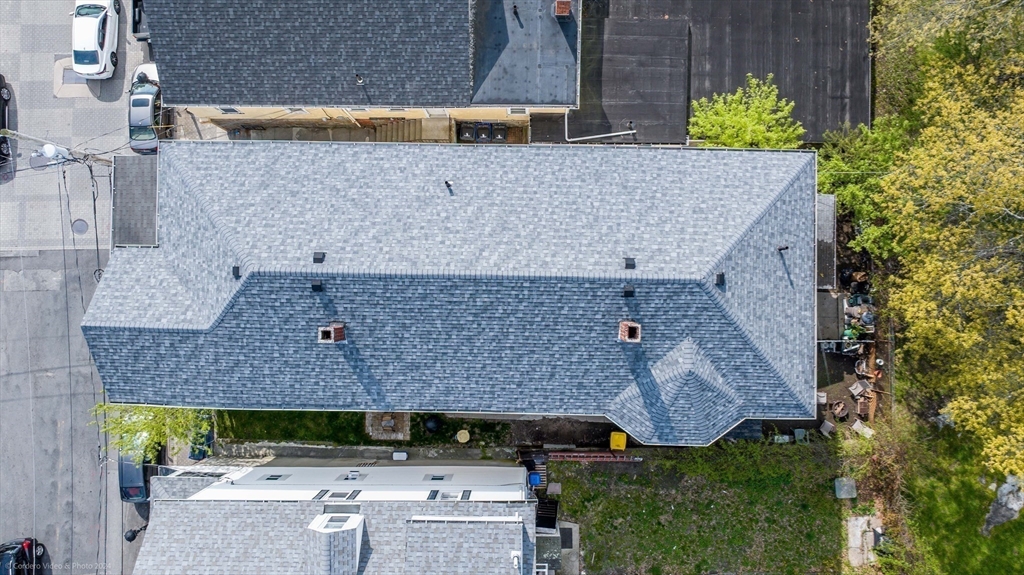 286 Columbia Street Fall River, MA 02721 - Photo 4 of 29 a aerial view of a house with a yard and large tree