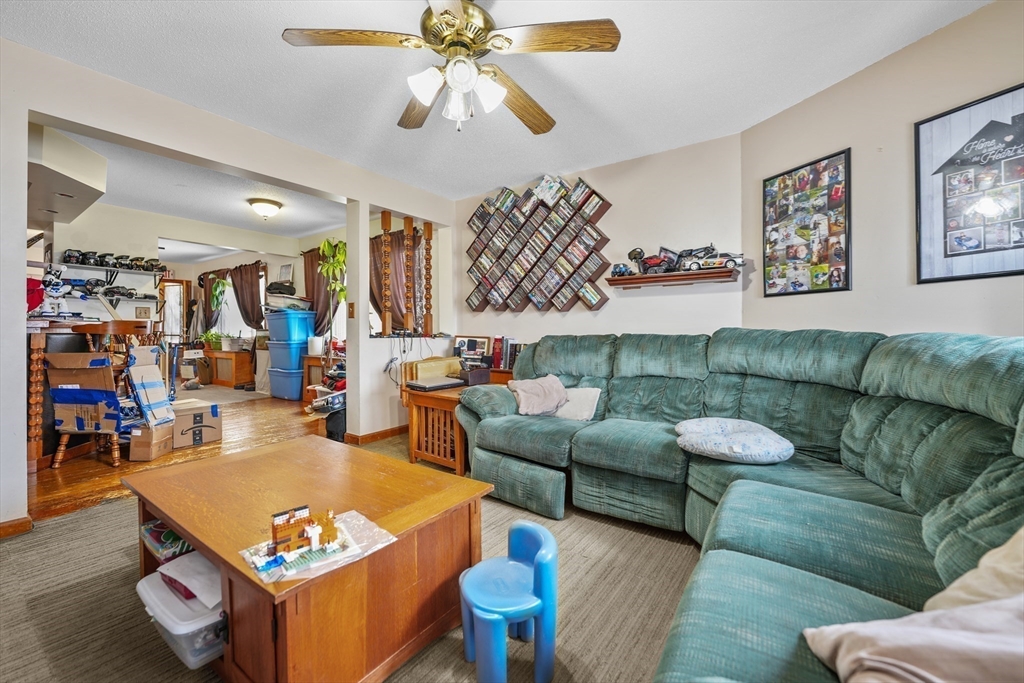 286 Columbia Street Fall River, MA 02721 - Photo 8 of 29 a living room with furniture and wooden floor