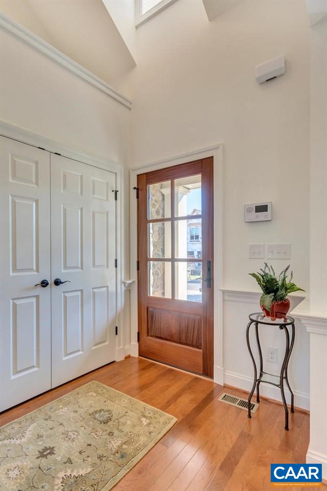 2631 South Bennington Road Charlottesville, VA 22901 - Photo 5 of 44 a view of empty room with wooden floor and furniture
