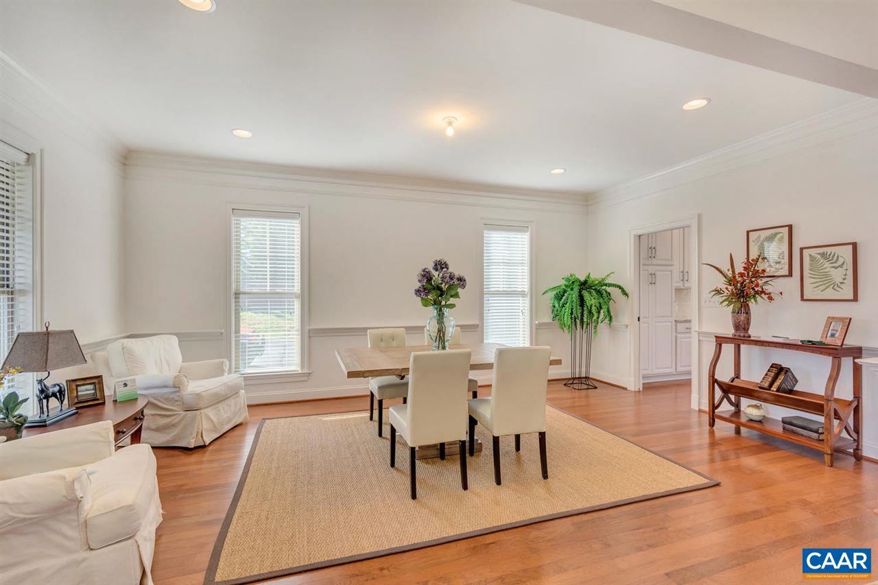 2631 South Bennington Road Charlottesville, VA 22901 - Photo 8 of 44 a view of a dining room with furniture window and wooden floor