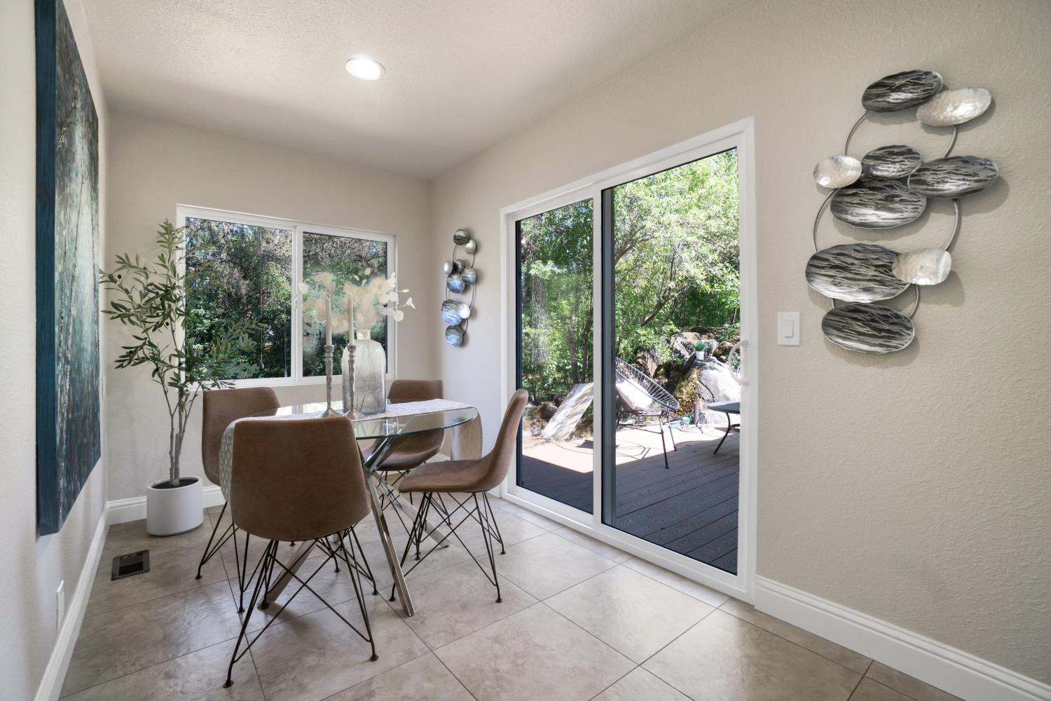 6299 Horseshoe Bar Road Loomis, CA 95650 - Photo 15 of 43 a dining room with furniture and wooden floor
