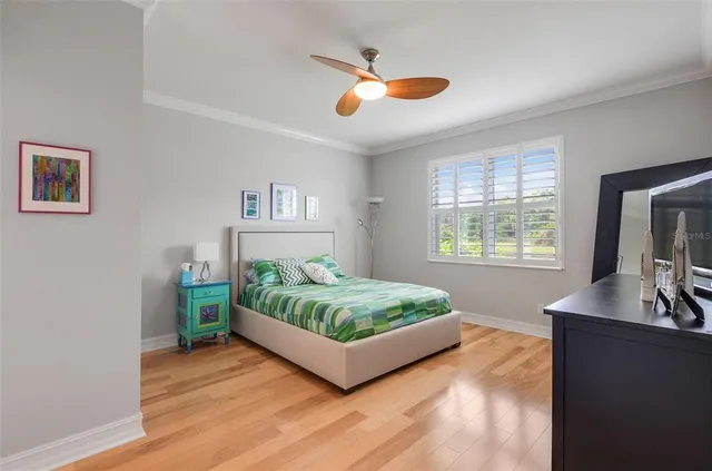 a bathroom with a granite countertop sink a mirror a shower and vanity