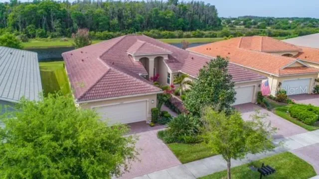 an aerial view of a house with outdoor space swimming pool and outdoor space