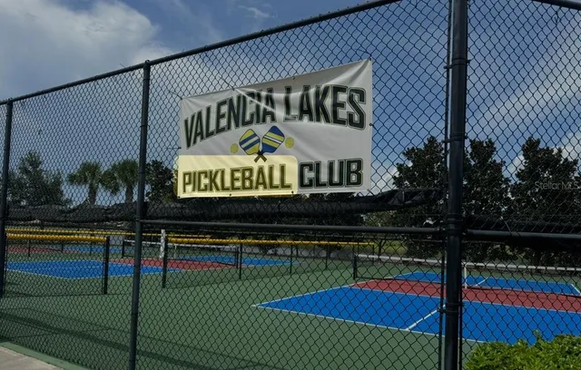 a view of a swimming pool and outdoor space