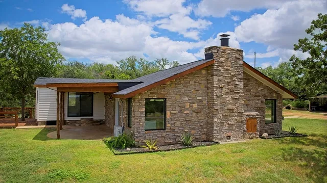 a view of a yard with an outdoor space