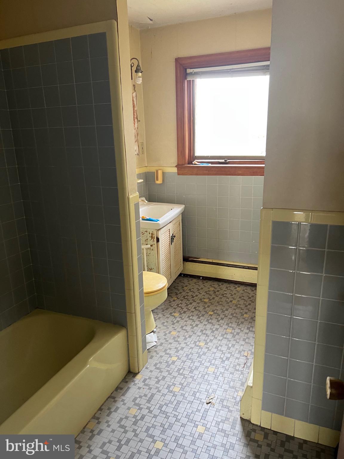 549 General Learned Road King of Prussia, PA 19406 - Photo 14 of 31 a bathroom with a tub a sink and a window