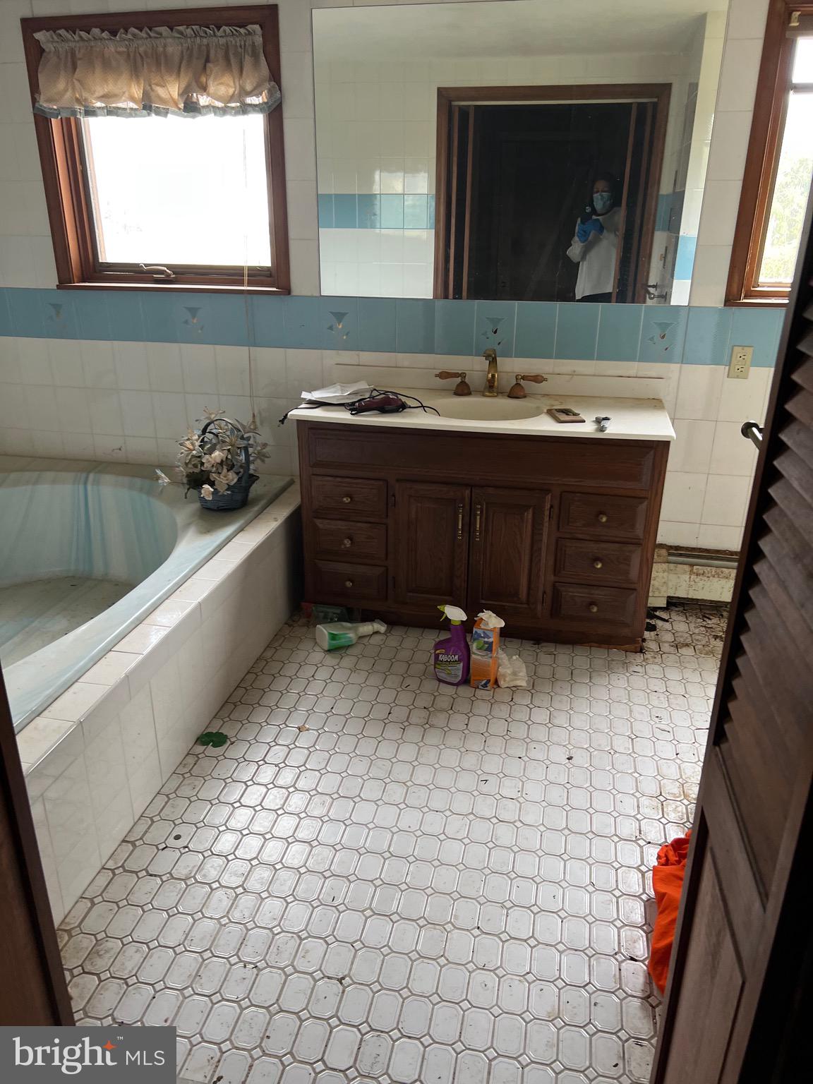 549 General Learned Road King of Prussia, PA 19406 - Photo 16 of 31 a bathroom with a sink and a mirror