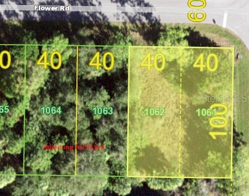 26153 Flower Road Punta Gorda, FL 33955 - Photo 4 of 6 a sign broad on the wall