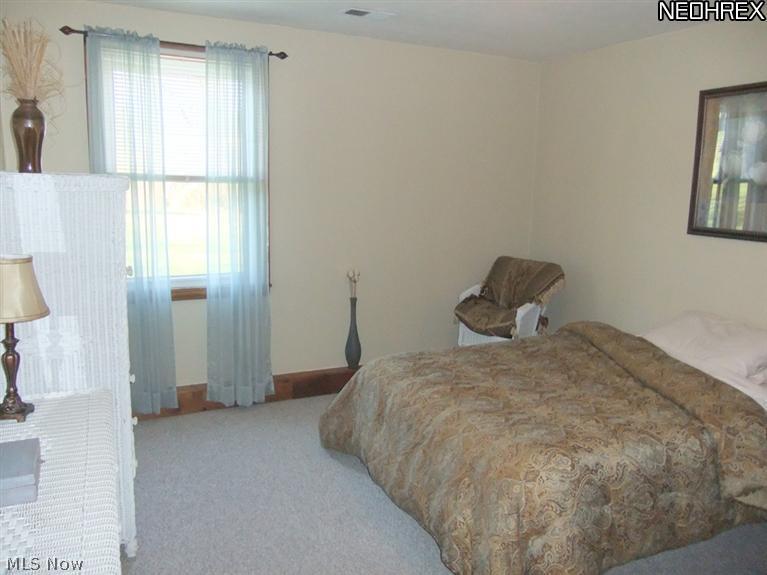 1290 Jacoby Road Akron, OH 44321 - Photo 20 of 24 This apartment offers a nice sized bedroom with a double closet.