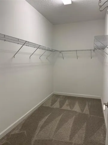 a view of a room with racks on the wall