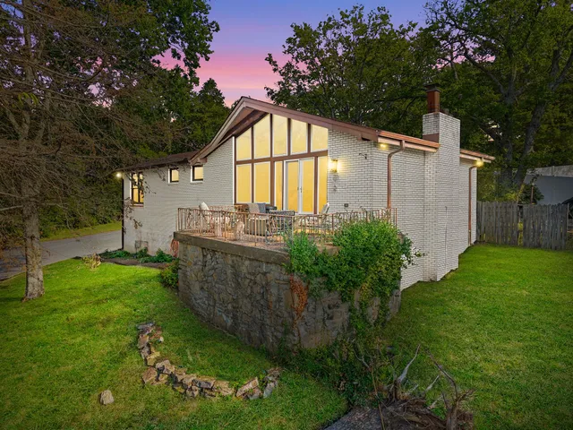 a view of a backyard with garden