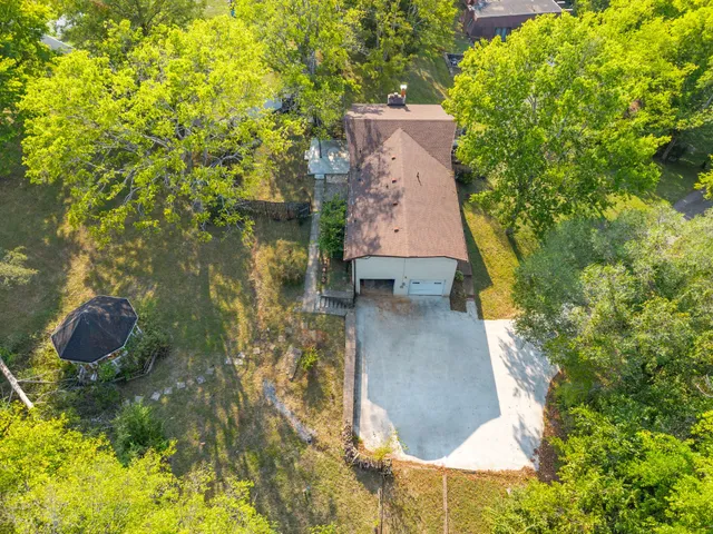 a view of a park with tree s
