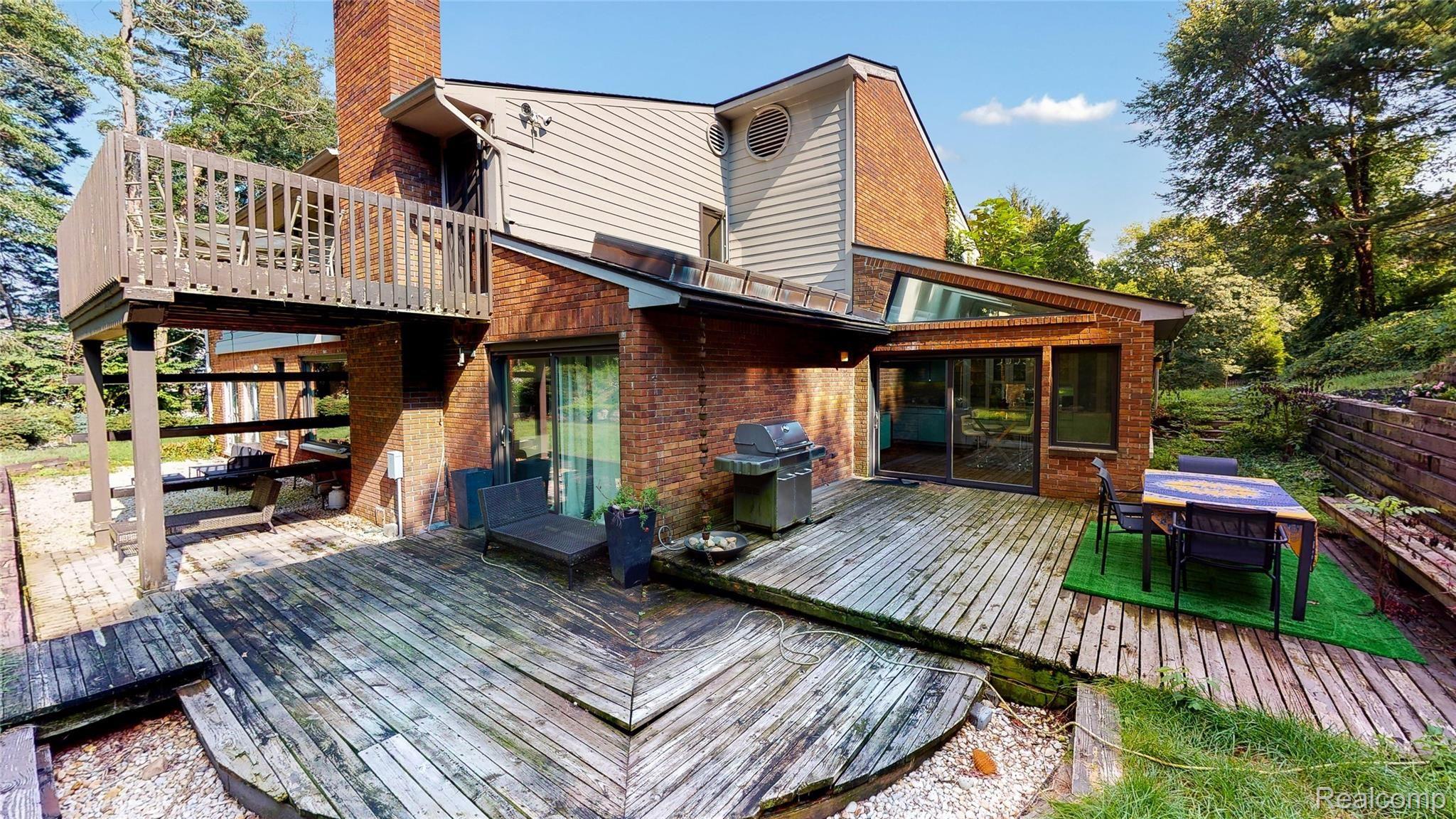 475 Goodhue Road Bloomfield Hills, MI 48304 - Photo 64 of 84 Welcome-To-475-Goodhue-Court-63-Deck-off-of-Family-Breakfast.jpg