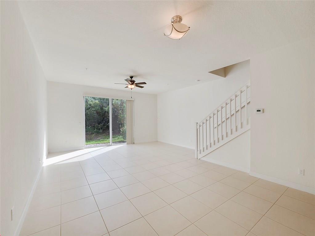 3055 Southwest Otter Lane Stuart, FL 34997 - Photo 2 of 13 a view of an empty room with a window