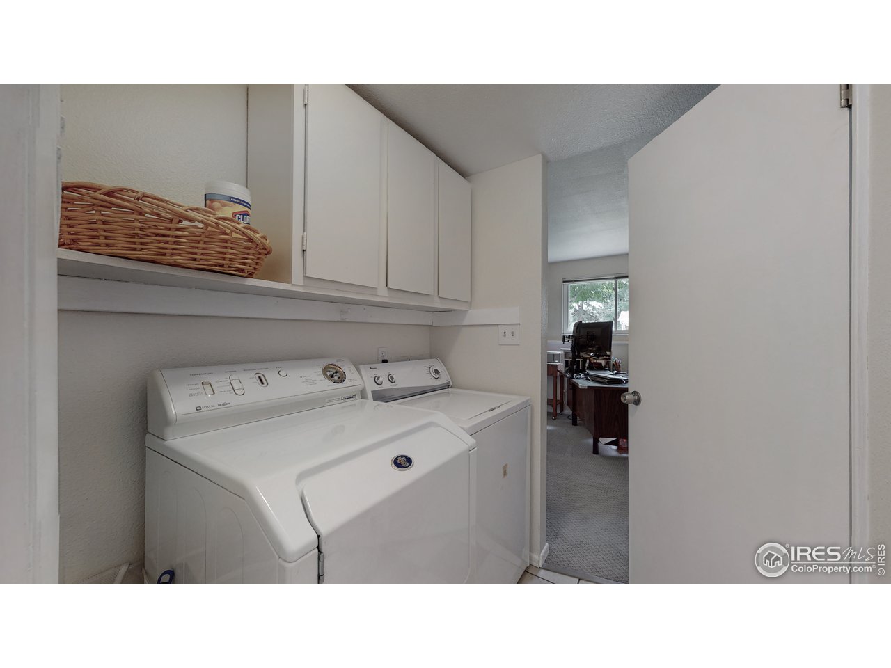 1412 Independence Road Fort Collins, CO 80526 - Photo 16 of 38 Laundry Room w/ Built in Cabinets