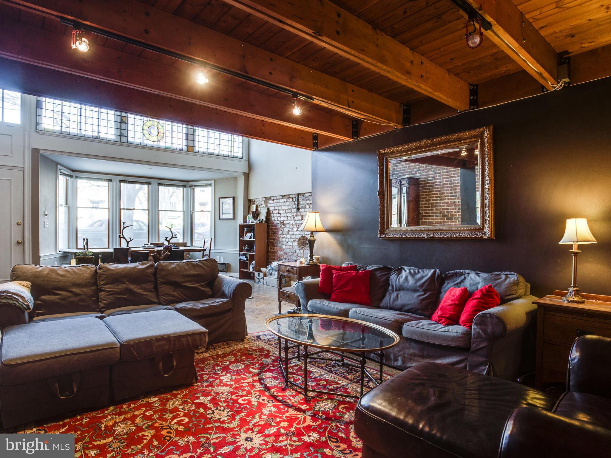1954 Calvert Street Northwest Washington, DC 20009 - Photo 3 of 30 Unit A Living Room, Exposed Wood Beam Ceiling