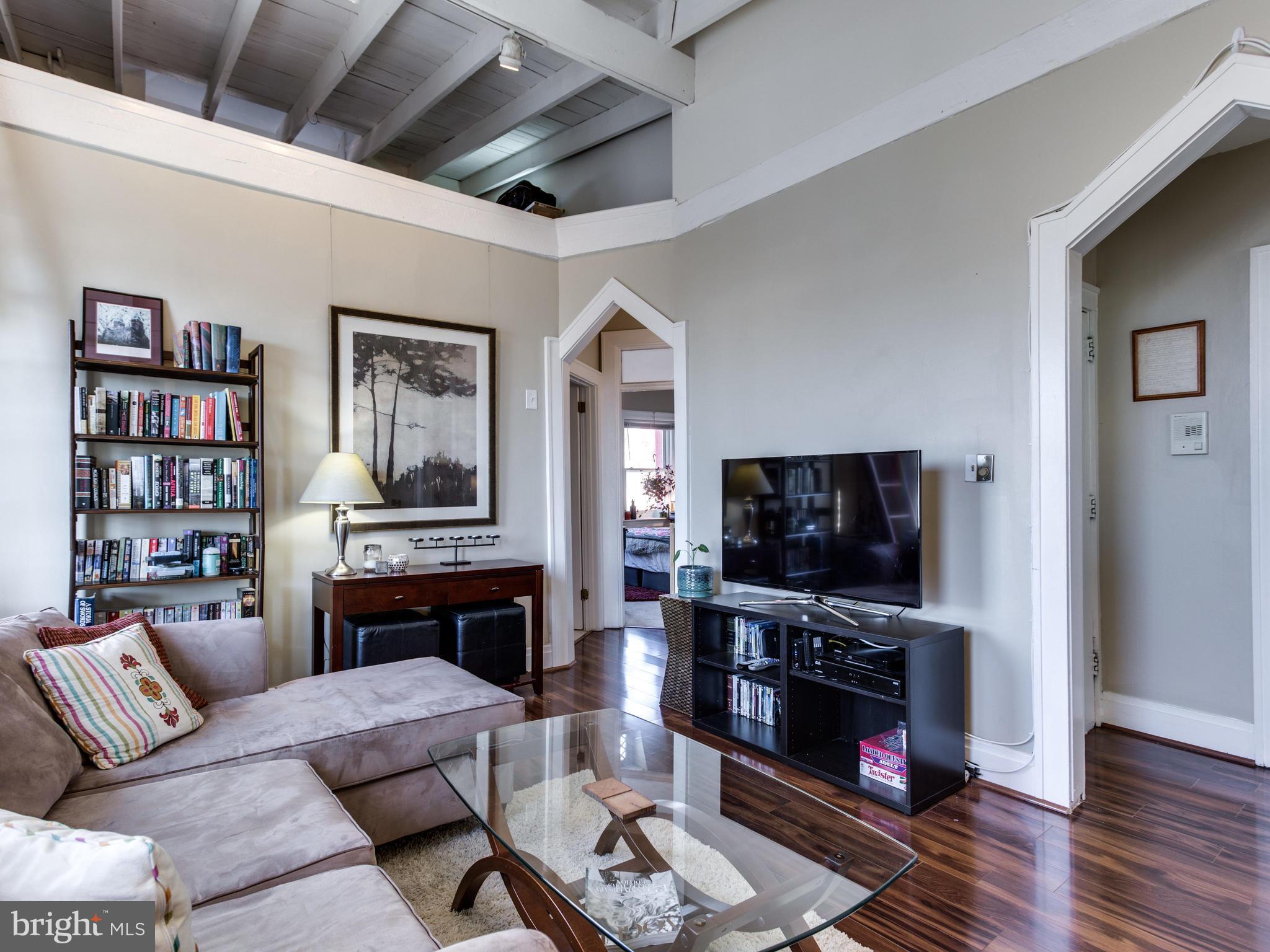 1954 Calvert Street Northwest Washington, DC 20009 - Photo 8 of 30 Unit 2 LR: Wood Flrs, High Ceils, Archways, Loft