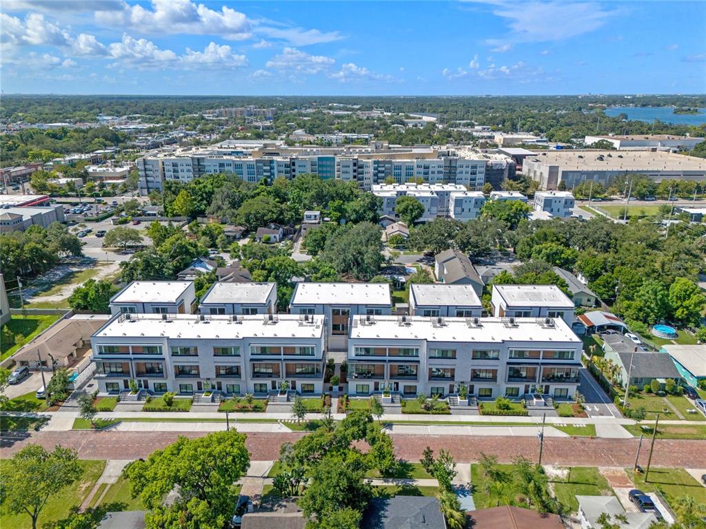 38 West Harding Street, Unit C Orlando, FL 32806 - Photo 31 of 32 an aerial view of residential building with outdoor space and lake view