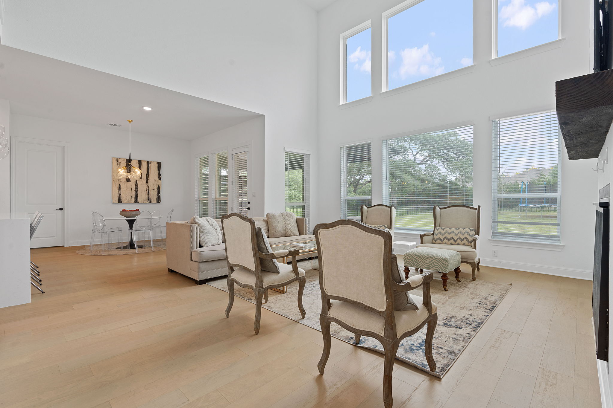 309 Pear Tree Lane Austin, TX 78737 - Photo 10 of 39 a living room with furniture and a large window