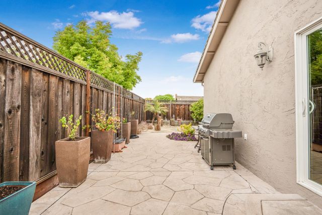 an aerial view of a house with a garden