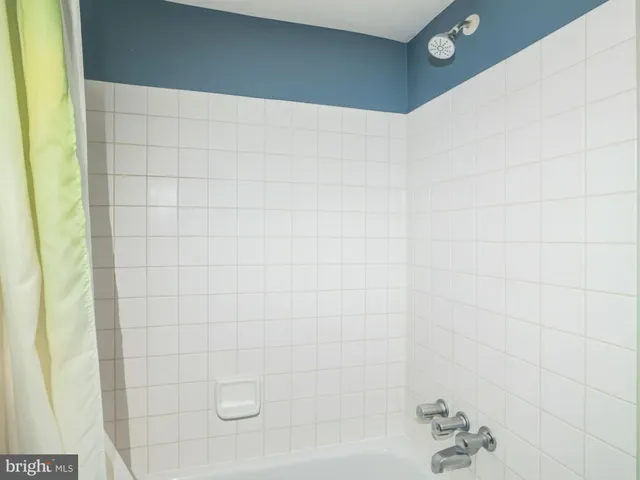 a view of a hallway with a white door