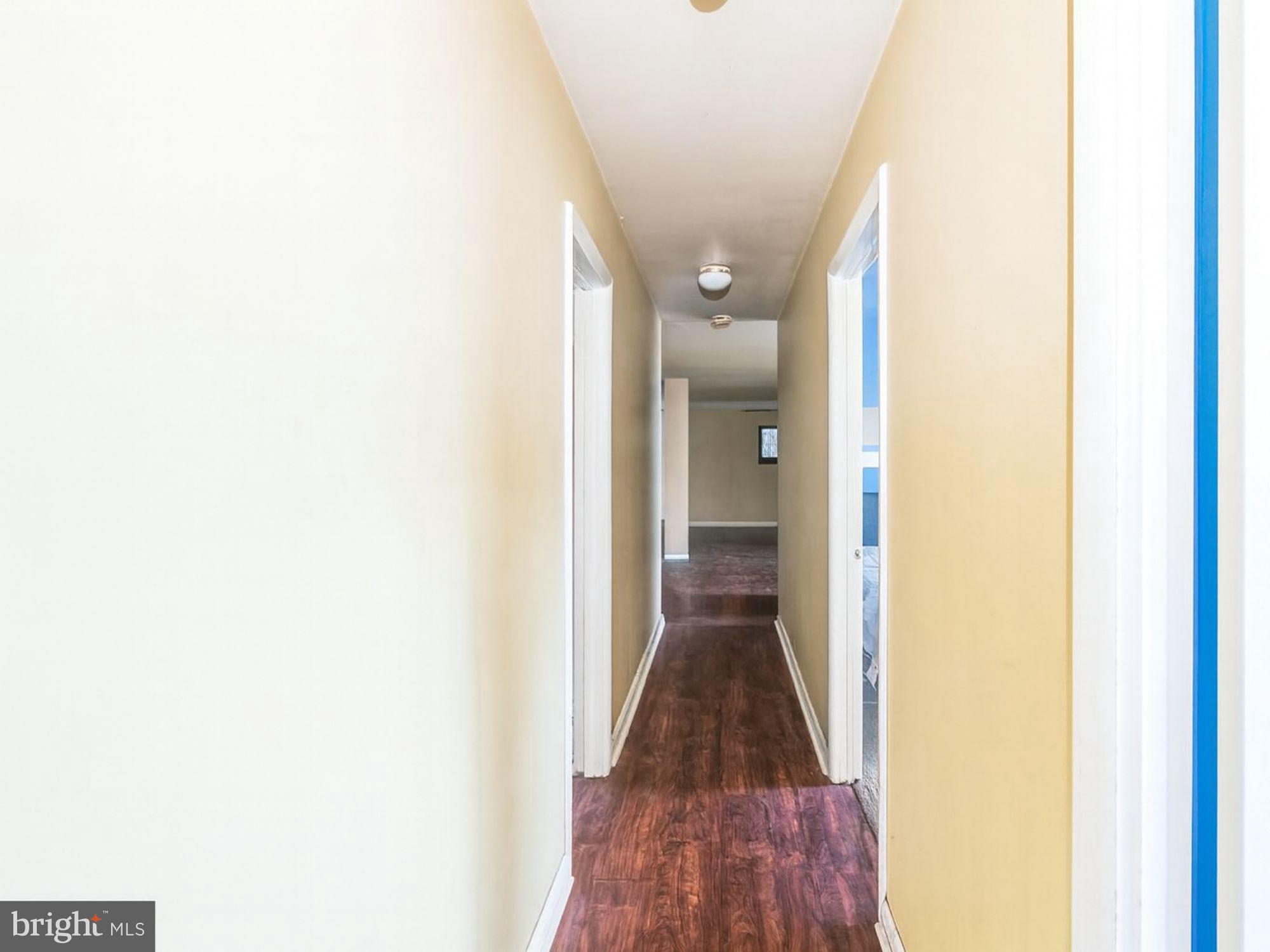 15708 Dorset Road, Unit 177 Laurel, MD 20707 - Photo 21 of 25 a view of a hallway with a white door