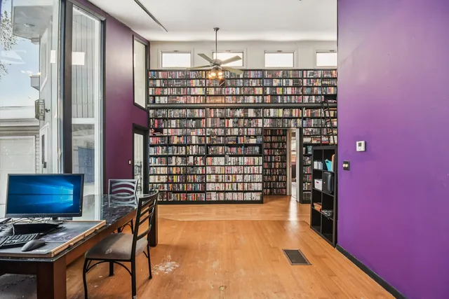 a view of a livingroom with furniture and window
