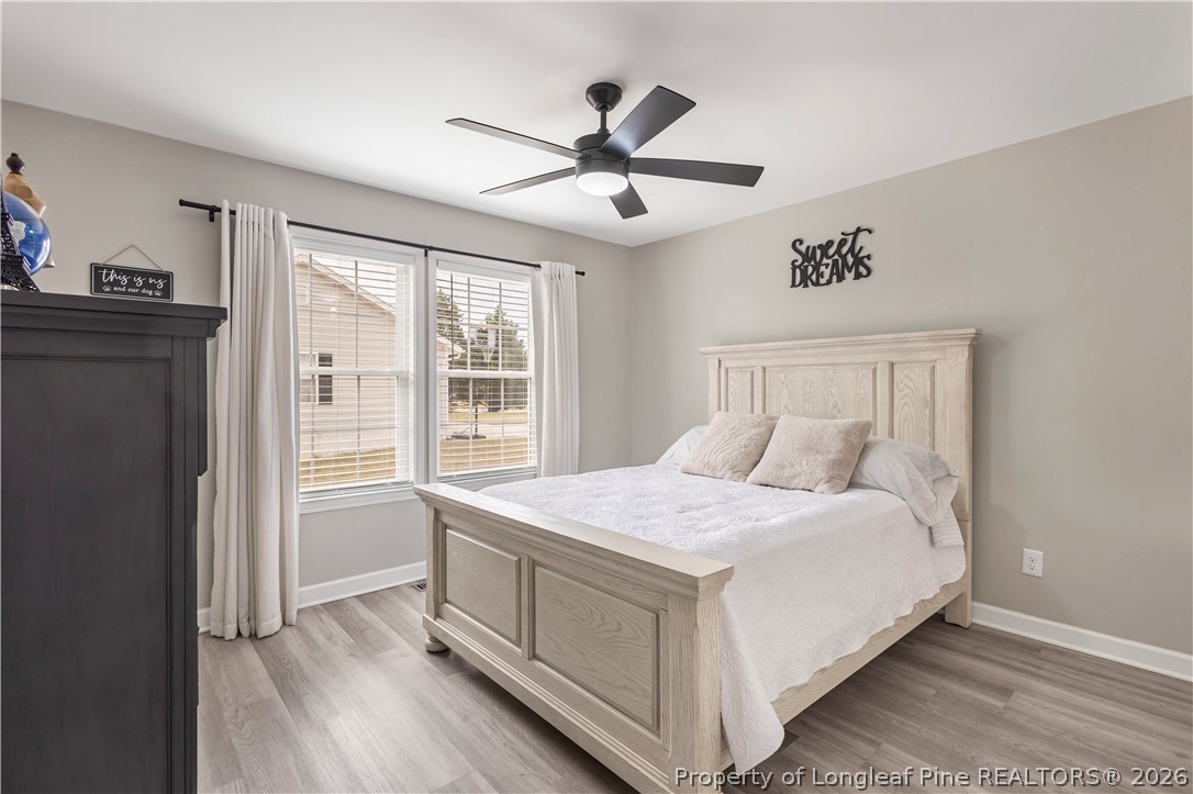 253 Farmstead Court Rockingham, NC 28379 - Photo 19 of 25 a bedroom with a bed and a window
