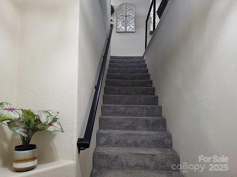 897 Fording Island Road, Unit 2208 Bluffton, SC 29910 - Photo 2 of 29 a view of staircase with white walls