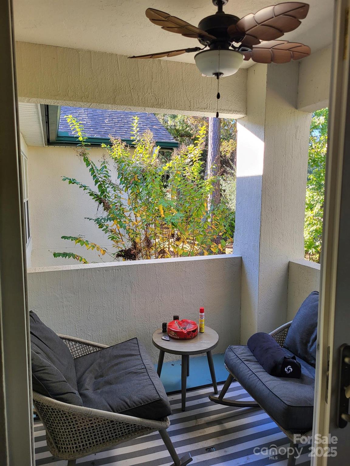 897 Fording Island Road, Unit 2208 Bluffton, SC 29910 - Photo 10 of 29 a view of table and chair in wooden floor