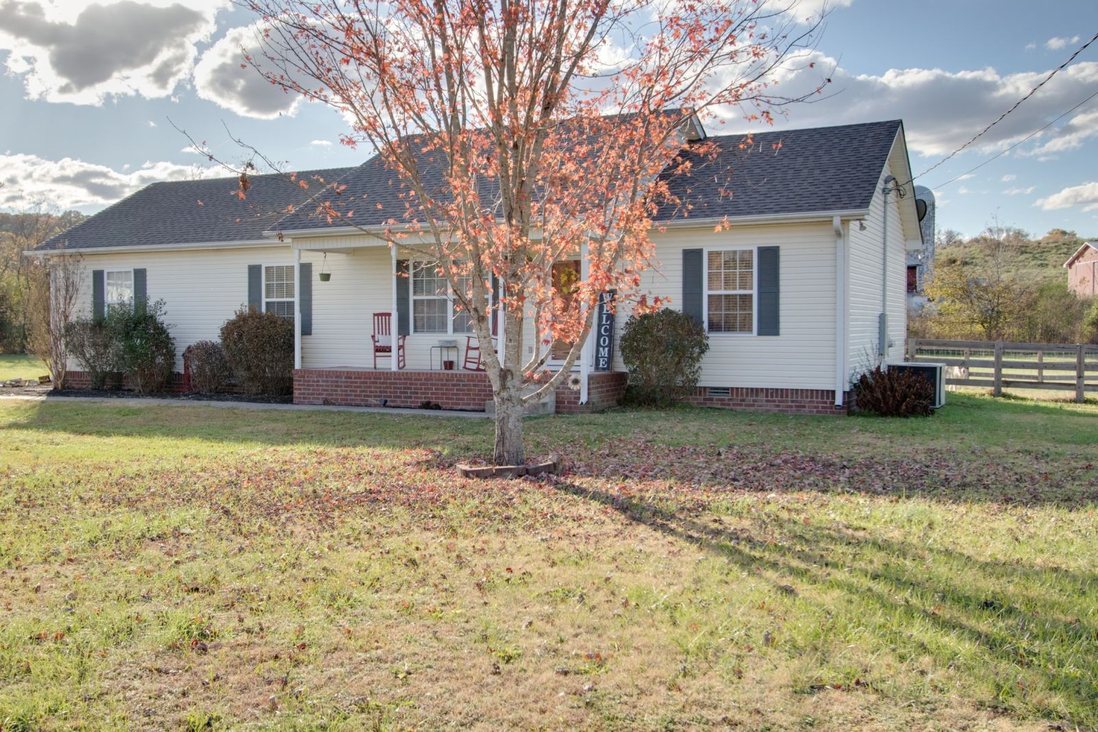 76 Fite Road Watertown, TN 37184 - Photo 2 of 19 a view of a house with backyard and tree