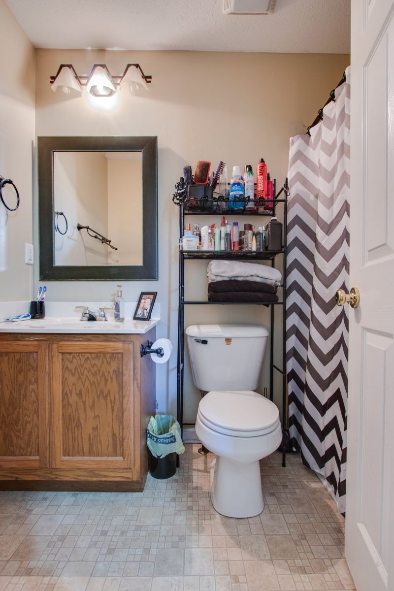 76 Fite Road Watertown, TN 37184 - Photo 13 of 19 a bathroom with a toilet a sink and a mirror