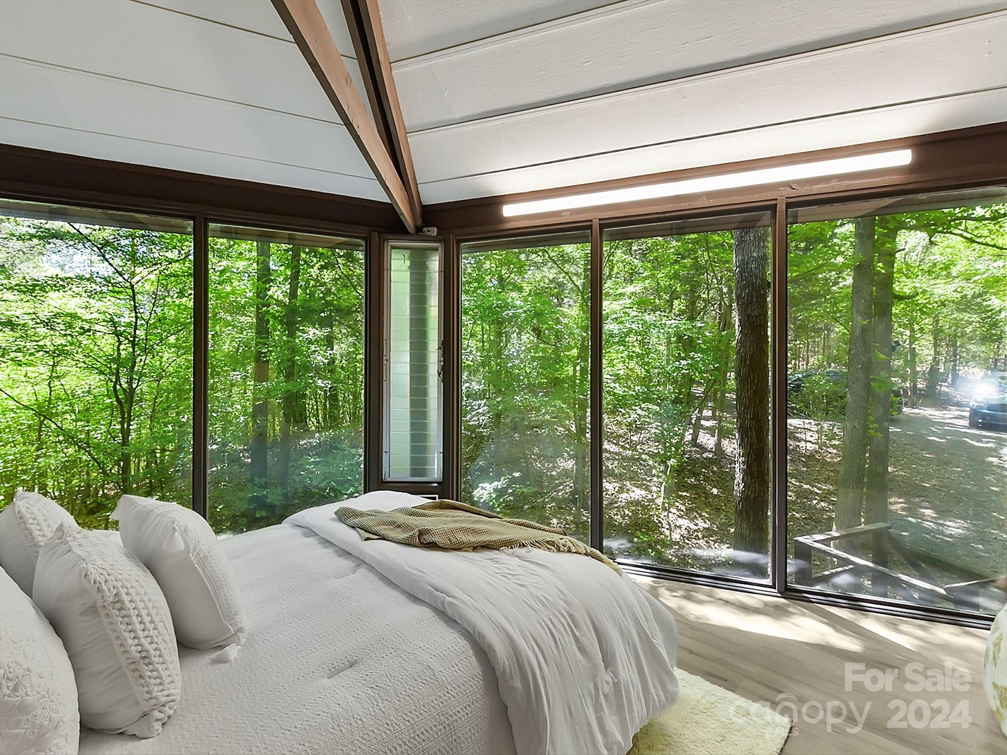 1665 Bowater Road Rock Hill, SC 29732 - Photo 14 of 43 a bedroom with a bed and a large window with balcony view