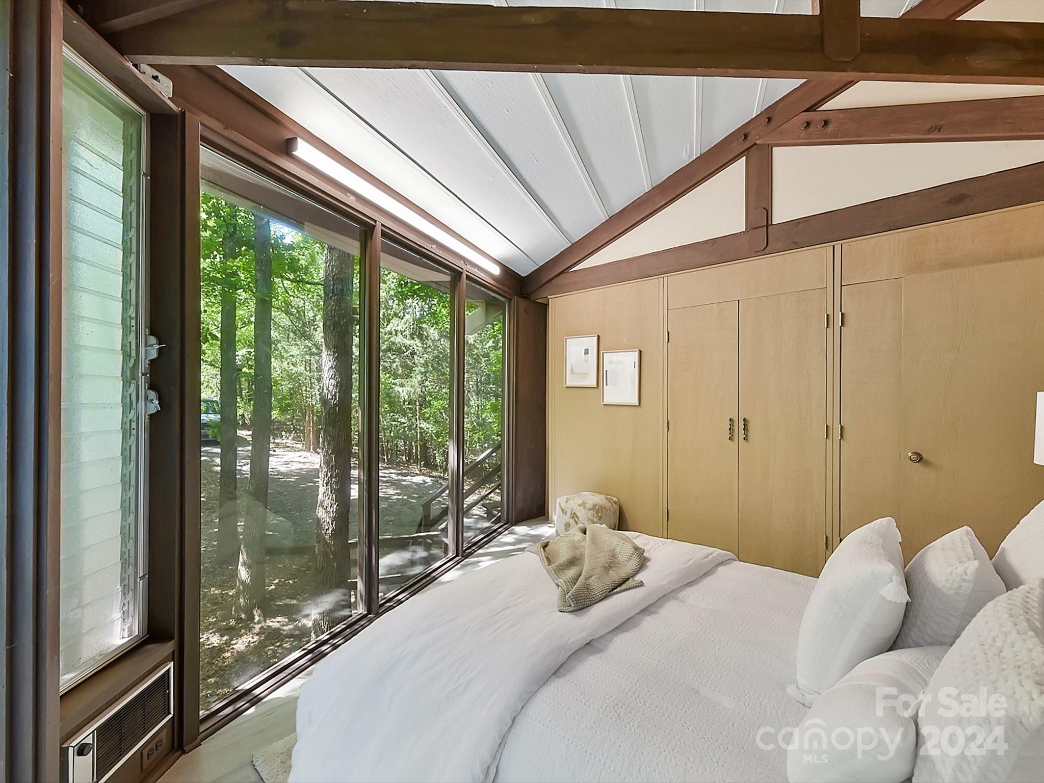 1665 Bowater Road Rock Hill, SC 29732 - Photo 15 of 43 a bedroom with a bed and wooden floor